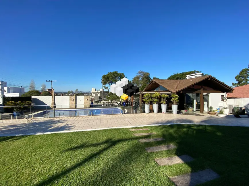 Foto 8 de Casa com 4 quartos à venda, 204m2 em Torres - RS