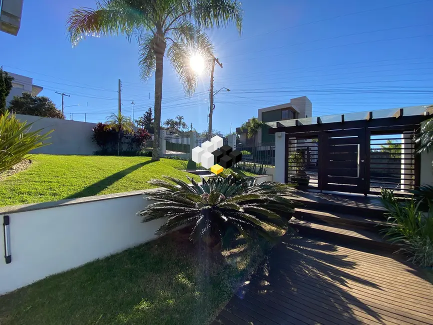 Foto 9 de Casa com 4 quartos à venda, 204m2 em Torres - RS