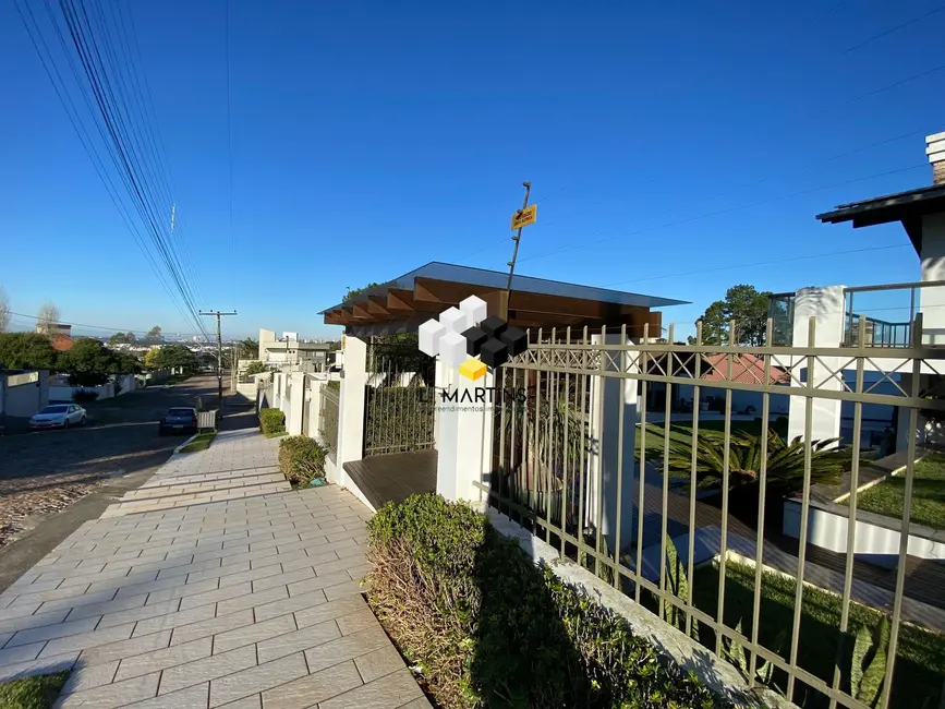 Foto 3 de Casa com 4 quartos à venda, 204m2 em Torres - RS