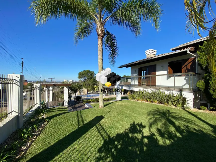 Foto 6 de Casa com 4 quartos à venda, 204m2 em Torres - RS