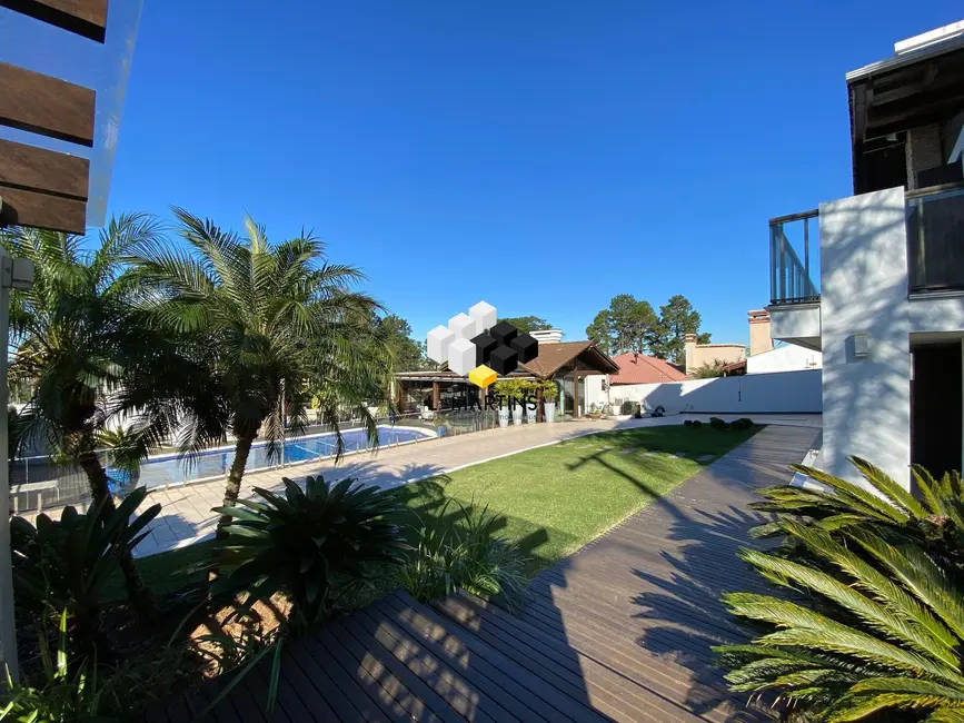 Foto 5 de Casa com 4 quartos à venda, 204m2 em Torres - RS