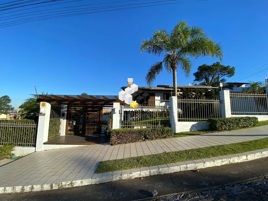 Foto 2 de Casa com 4 quartos à venda, 204m2 em Torres - RS