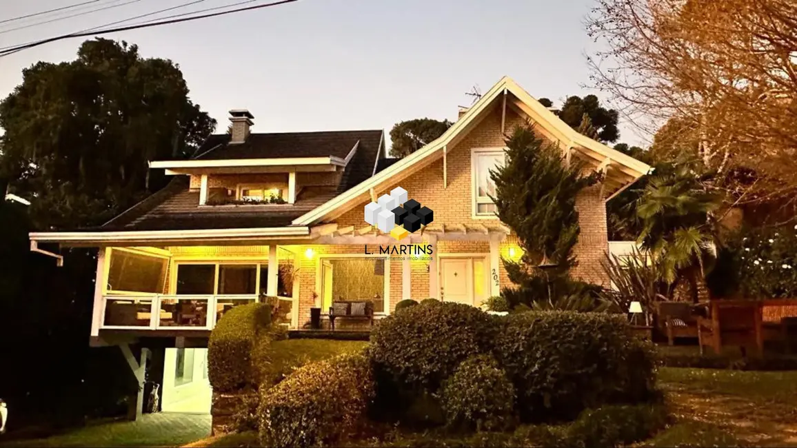 Casa de Condomínio com 3 quartos à venda, 342m2 em Centro, Gramado - RS - imagem 1 Foto 1 de Casa de Condomínio com 3 quartos à venda, 342m2 em Centro, Gramado - RS