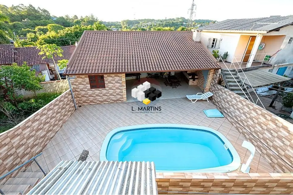 Casa com 3 quartos à venda, 229m2 em Petrópolis, Novo Hamburgo - RS - imagem 6 Foto 6 de Casa com 3 quartos à venda, 229m2 em Petrópolis, Novo Hamburgo - RS