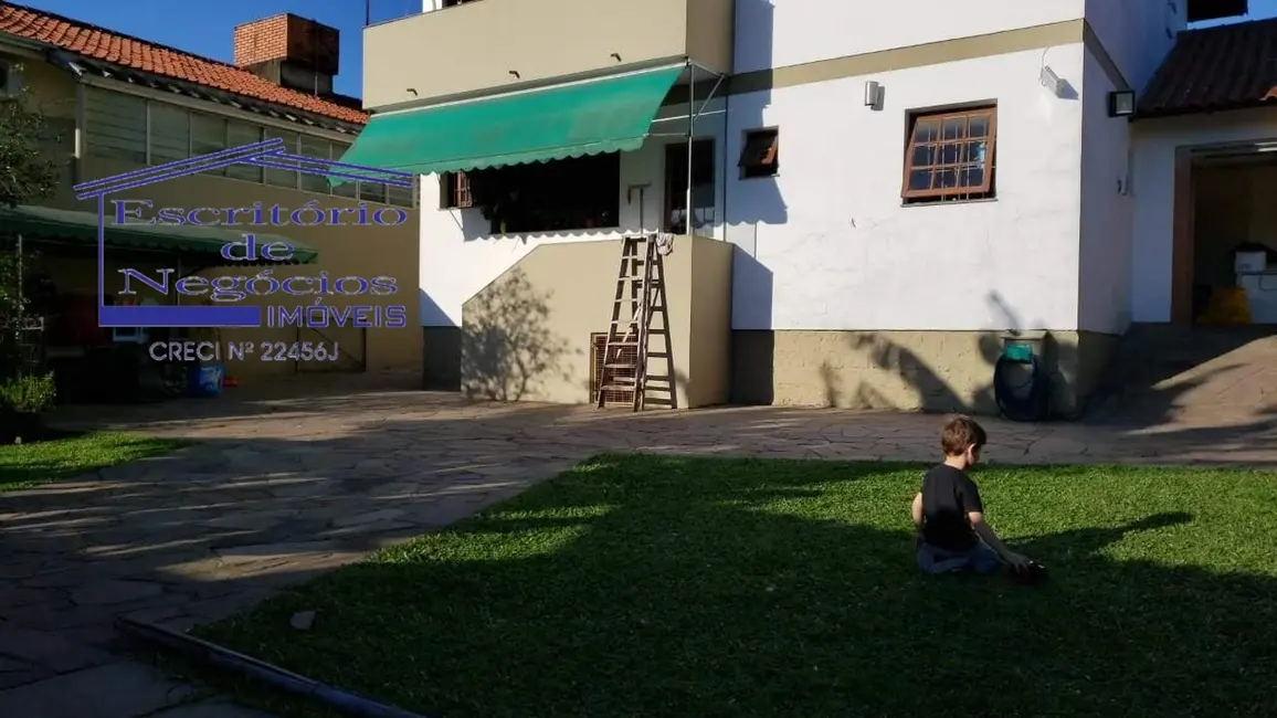 Foto 2 de Casa com 4 quartos à venda, 268m2 em Cavalhada, Porto Alegre - RS