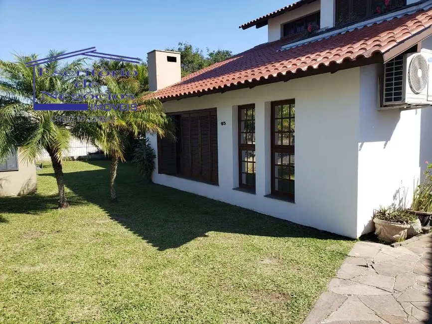 Foto 1 de Casa com 4 quartos à venda, 268m2 em Cavalhada, Porto Alegre - RS