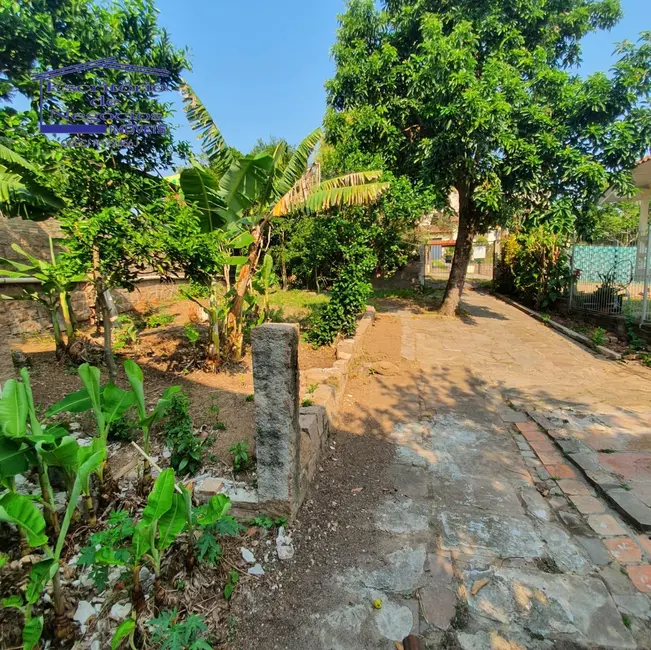 Foto 26 de Casa com 3 quartos à venda, 150m2 em Vila Nova, Porto Alegre - RS