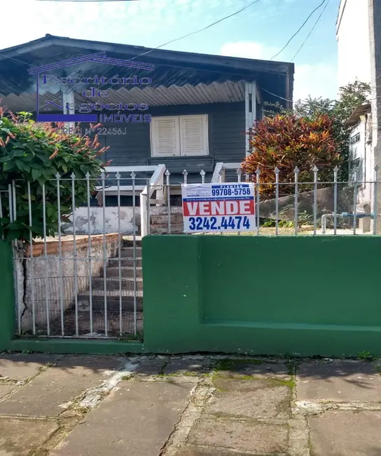 Foto 2 de Casa com 6 quartos à venda, 150m2 em Cavalhada, Porto Alegre - RS