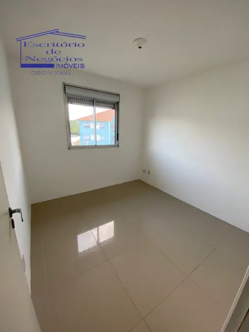 Foto 6 de Apartamento com 2 quartos à venda, 47m2 em Vila Nova, Porto Alegre - RS