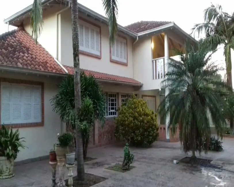Casa com 4 quartos à venda, 300m2 em Belém Novo, Porto Alegre - RS - imagem 1 Foto 1 de Casa com 4 quartos à venda, 300m2 em Belém Novo, Porto Alegre - RS