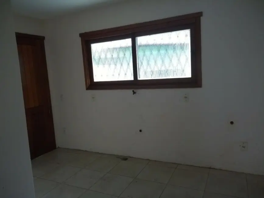 Foto 2 de Casa com 2 quartos à venda, 100m2 em Guarujá, Porto Alegre - RS