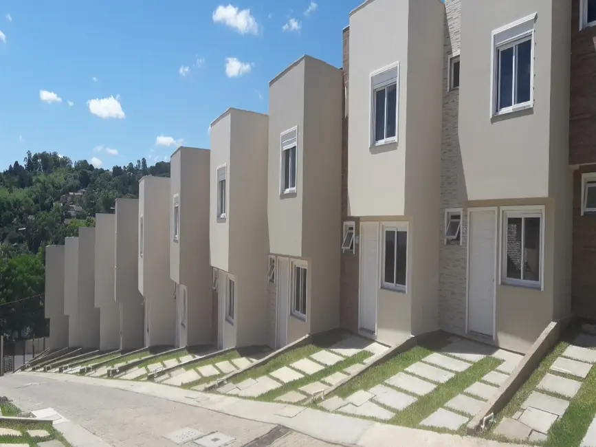 Foto 1 de Casa de Condomínio com 3 quartos à venda, 75m2 em Vila Nova, Porto Alegre - RS