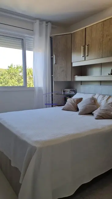 Foto 6 de Apartamento com 2 quartos à venda, 57m2 em Vila Nova, Porto Alegre - RS