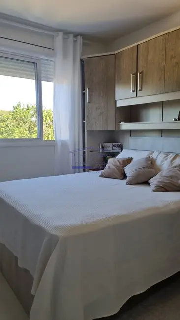 Foto 6 de Apartamento com 2 quartos à venda, 57m2 em Vila Nova, Porto Alegre - RS