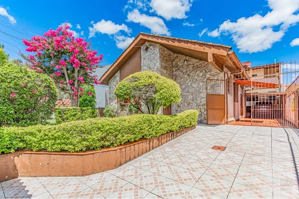 Foto 1 de Casa com 5 quartos à venda, 131m2 em Cavalhada, Porto Alegre - RS