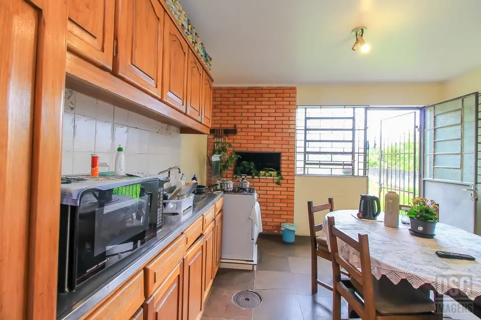 Foto 7 de Casa com 3 quartos à venda, 299m2 em Glória, Porto Alegre - RS