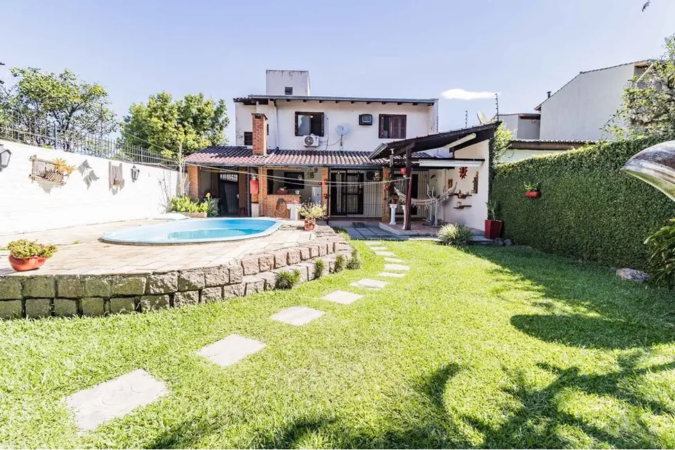 Foto 6 de Casa com 3 quartos à venda, 235m2 em Guarujá, Porto Alegre - RS