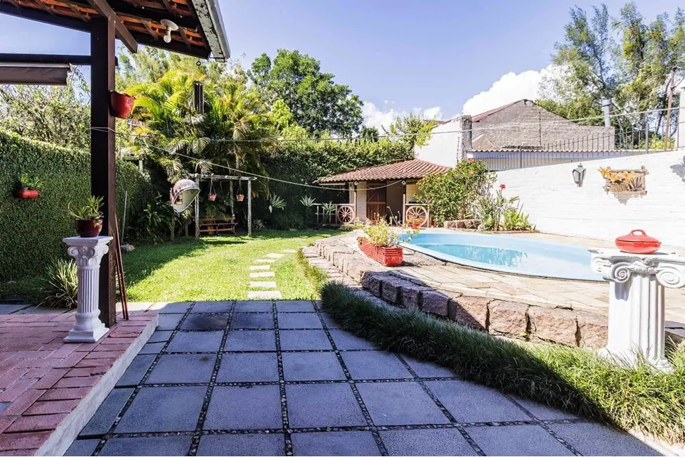 Foto 5 de Casa com 3 quartos à venda, 235m2 em Guarujá, Porto Alegre - RS