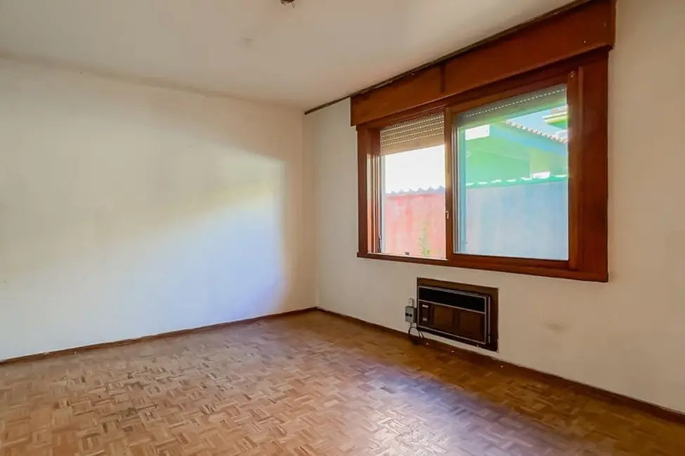 Casa com 3 quartos à venda, 200m2 em Jardim Lindóia, Porto Alegre - RS - imagem 3 Foto 3 de Casa com 3 quartos à venda, 200m2 em Jardim Lindóia, Porto Alegre - RS