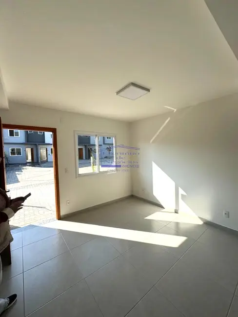 Foto 8 de Casa de Condomínio com 2 quartos para alugar, 58m2 em Vila Nova, Porto Alegre - RS