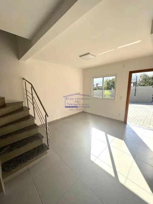 Foto 1 de Casa de Condomínio com 2 quartos para alugar, 58m2 em Vila Nova, Porto Alegre - RS
