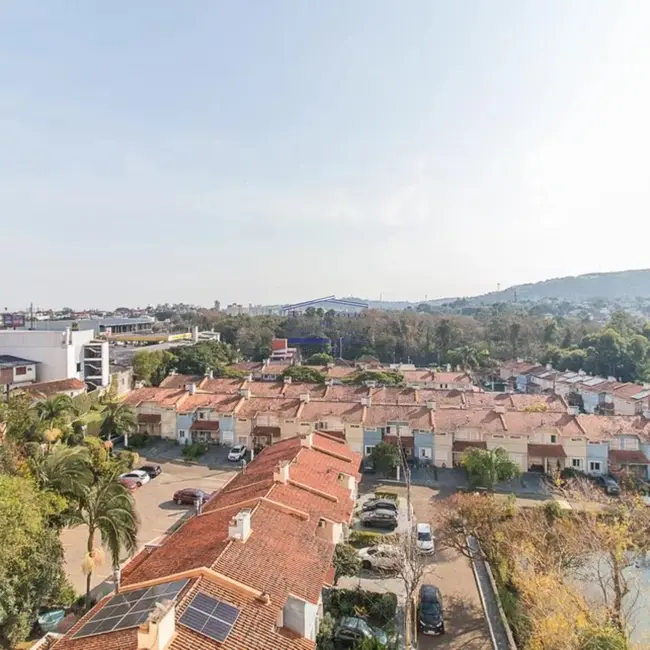 Foto 3 de Apartamento com 3 quartos à venda, 53m2 em Cavalhada, Porto Alegre - RS