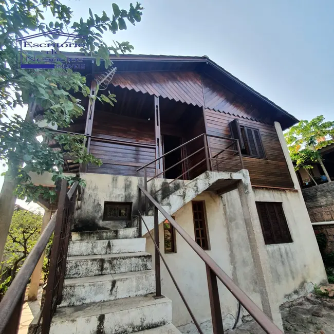 Foto 1 de Casa com 3 quartos para alugar, 200m2 em Vila Nova, Porto Alegre - RS