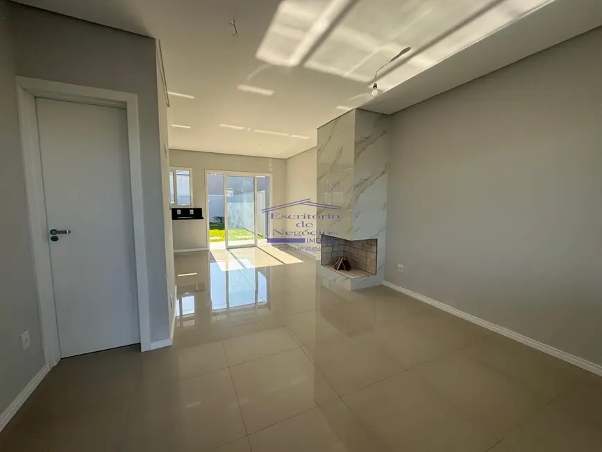 Foto 2 de Casa com 3 quartos à venda, 115m2 em Hípica, Porto Alegre - RS