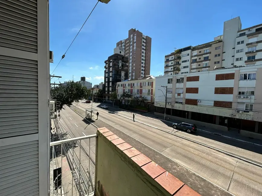 Apartamento com 2 quartos à venda, 59m2 em Menino Deus, Porto Alegre - RS - imagem 1 Foto 1 de Apartamento com 2 quartos à venda, 59m2 em Menino Deus, Porto Alegre - RS