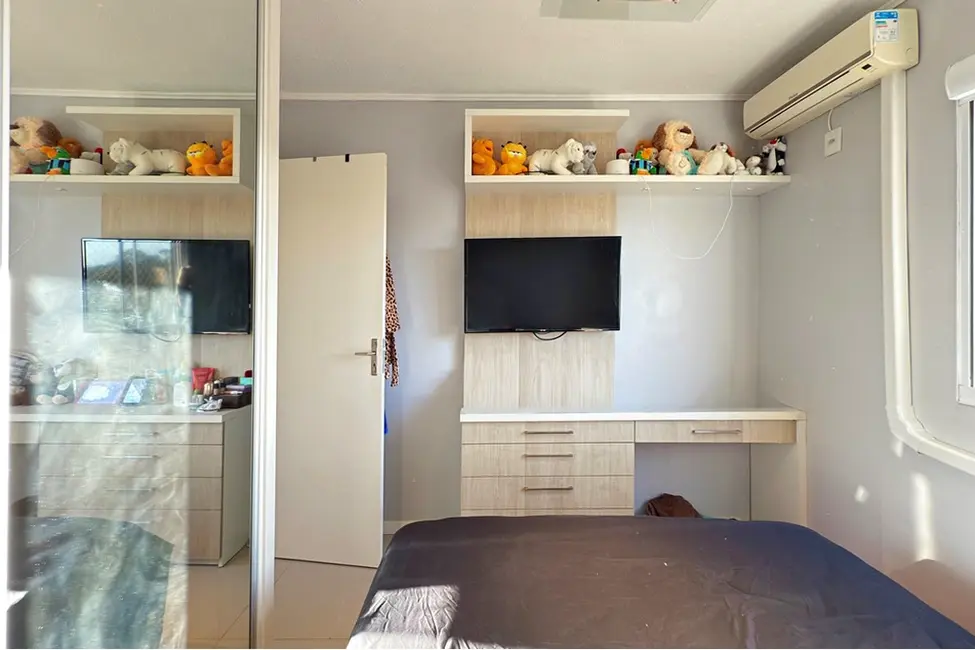Foto 2 de Apartamento com 2 quartos à venda, 50m2 em Vila Nova, Porto Alegre - RS
