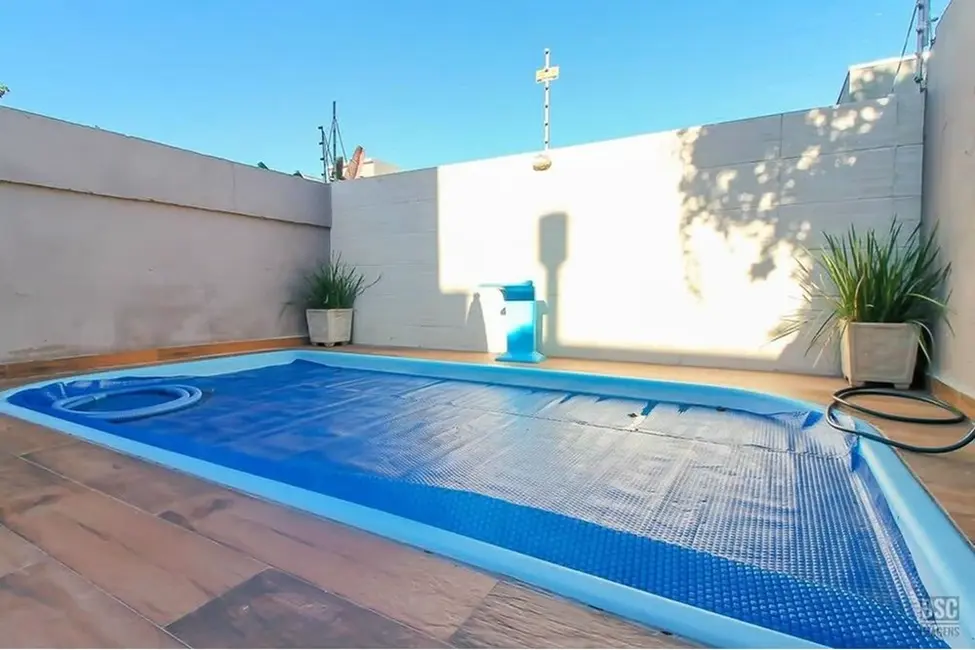 Casa com 3 quartos à venda, 128m2 em Hípica, Porto Alegre - RS - imagem 4 Foto 4 de Casa com 3 quartos à venda, 128m2 em Hípica, Porto Alegre - RS