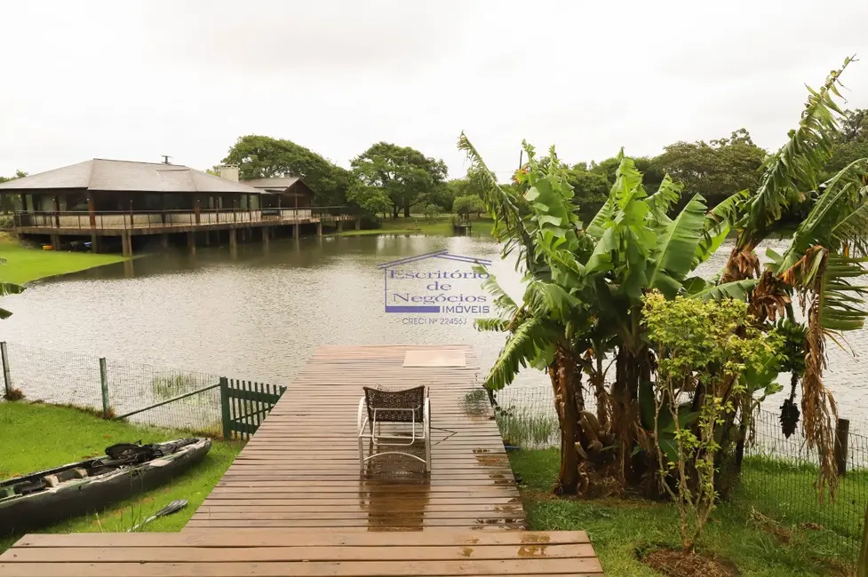 Foto 1 de Casa de Condomínio com 6 quartos à venda, 260m2 em Belém Novo, Porto Alegre - RS