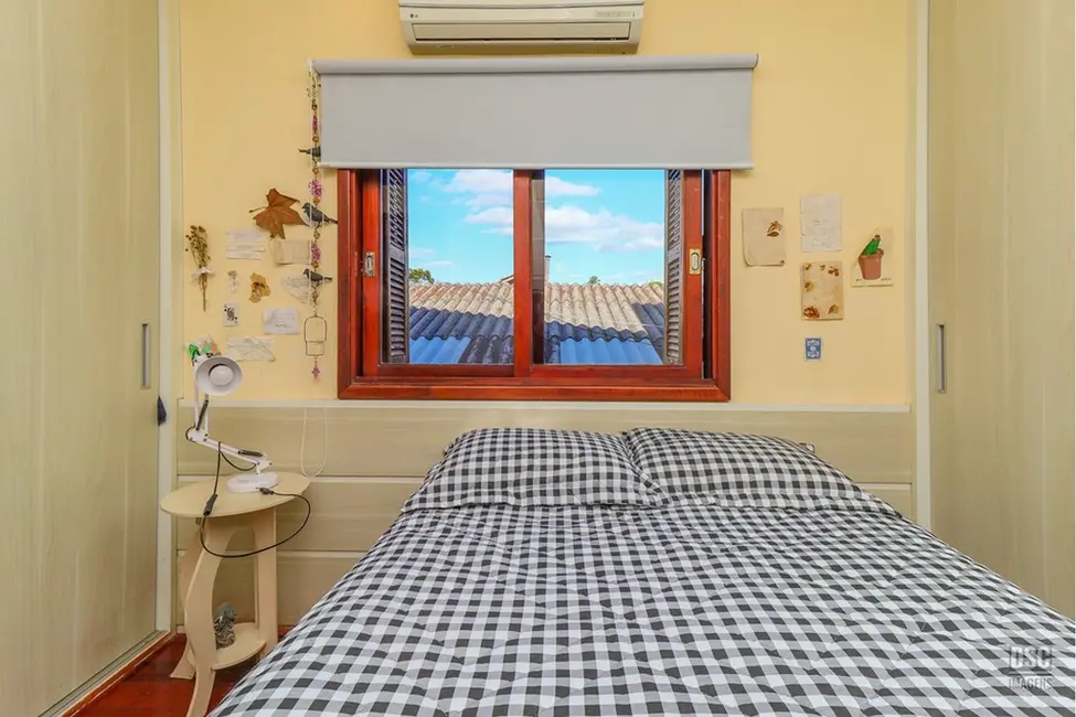 Foto 2 de Casa com 6 quartos à venda, 321m2 em Rubem Berta, Porto Alegre - RS