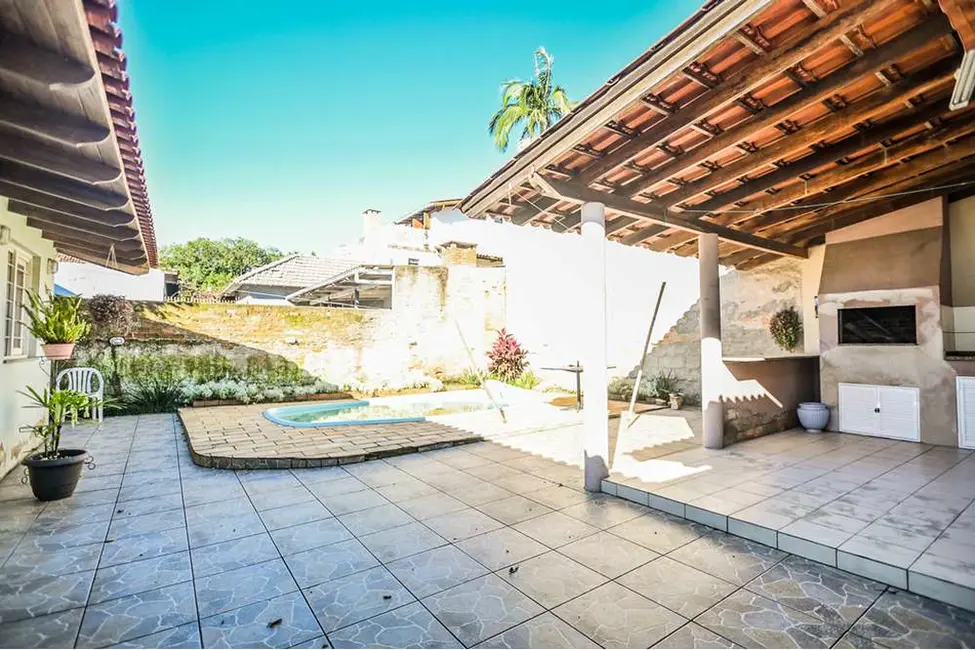 Casa com 3 quartos à venda, 150m2 em Santa Tereza, Porto Alegre - RS - imagem 8 Foto 8 de Casa com 3 quartos à venda, 150m2 em Santa Tereza, Porto Alegre - RS