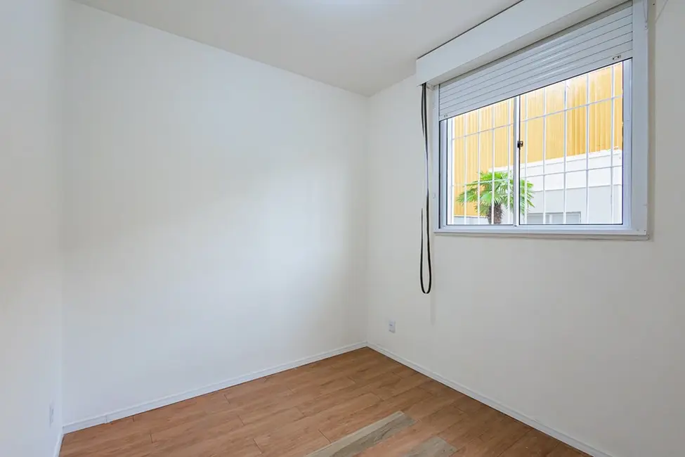 Foto 2 de Apartamento com 2 quartos à venda, 48m2 em Glória, Porto Alegre - RS