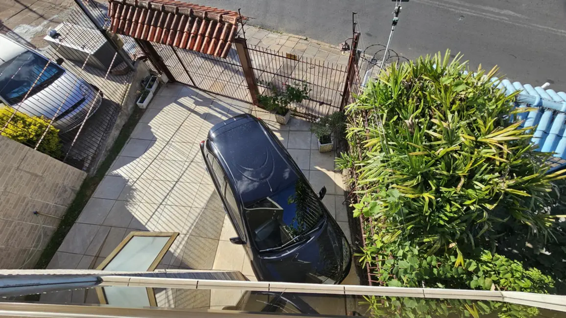 Foto 3 de Casa com 4 quartos à venda, 167m2 em Santo Antônio, Porto Alegre - RS