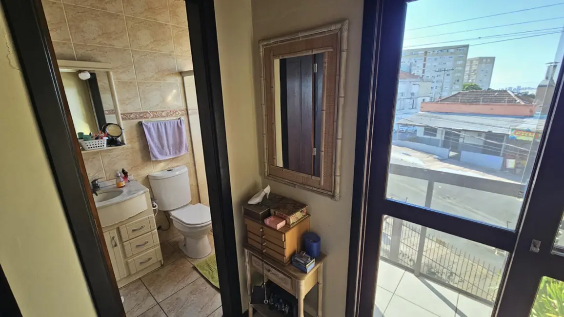 Foto 8 de Casa com 4 quartos à venda, 167m2 em Santo Antônio, Porto Alegre - RS