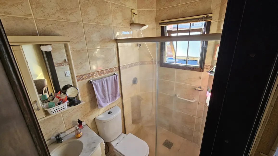 Foto 7 de Casa com 4 quartos à venda, 167m2 em Santo Antônio, Porto Alegre - RS