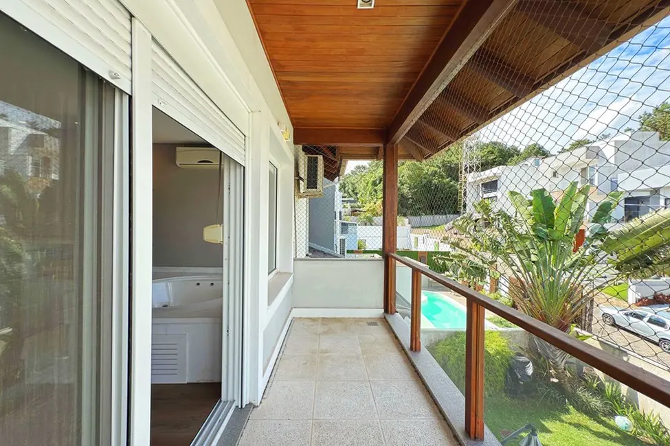 Foto 8 de Casa com 3 quartos à venda, 243m2 em Hípica, Porto Alegre - RS