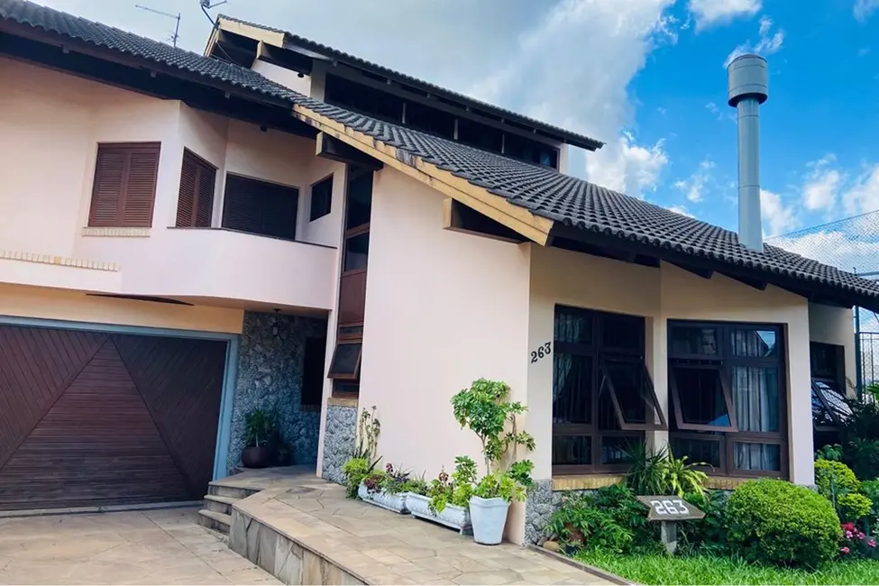 Foto 1 de Casa com 4 quartos à venda, 372m2 em Porto Alegre - RS