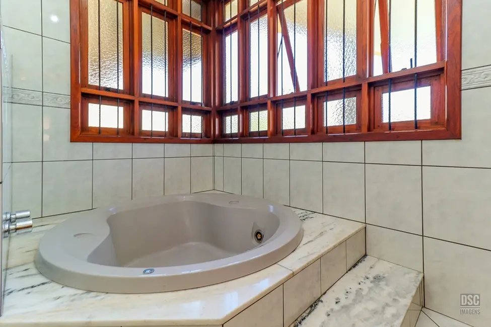 Foto 8 de Casa com 4 quartos à venda, 427m2 em Ipanema, Porto Alegre - RS