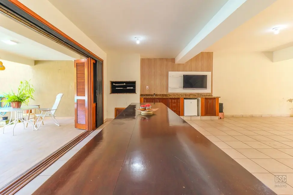 Foto 3 de Casa com 4 quartos à venda, 427m2 em Ipanema, Porto Alegre - RS