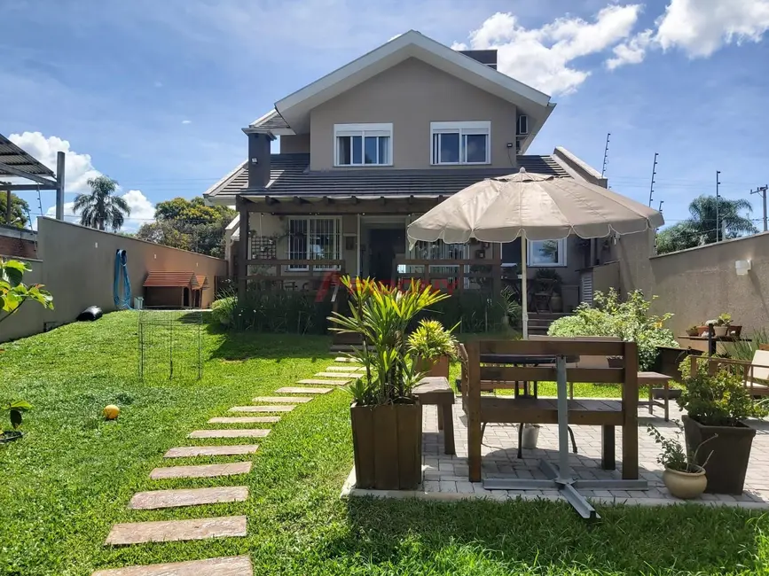 Foto 1 de Casa com 4 quartos à venda, 205m2 em Diácono João Luiz Pozzobon, Santa Maria - RS
