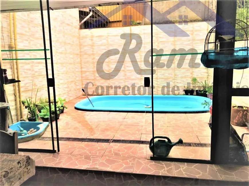 Casa com 3 quartos à venda, 110m2 em Serraria, Porto Alegre - RS - imagem 1 Foto 1 de Casa com 3 quartos à venda, 110m2 em Serraria, Porto Alegre - RS