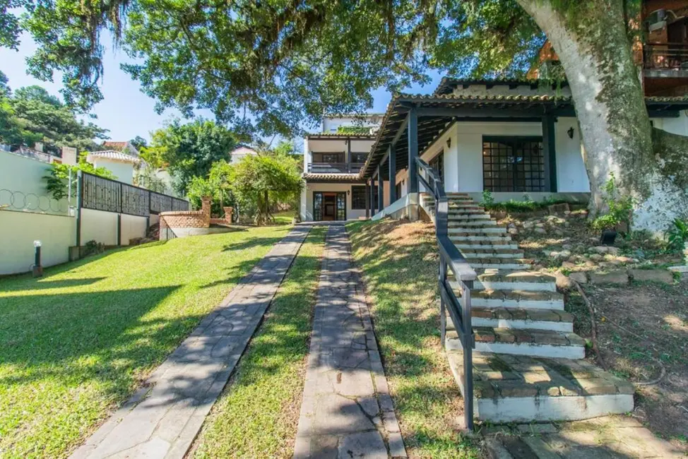 Foto 1 de Casa com 4 quartos à venda, 348m2 em Ipanema, Porto Alegre - RS