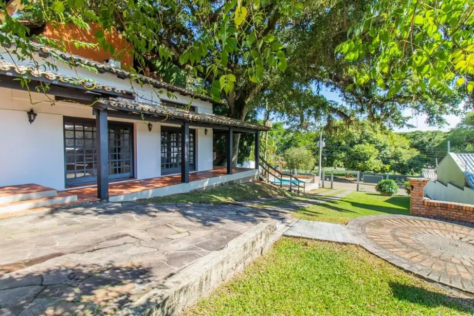 Foto 2 de Casa com 4 quartos à venda, 348m2 em Ipanema, Porto Alegre - RS