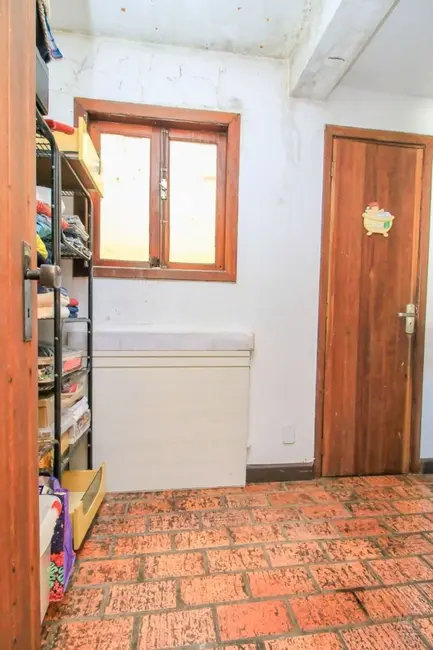 Foto 2 de Casa com 3 quartos à venda, 105m2 em Cavalhada, Porto Alegre - RS