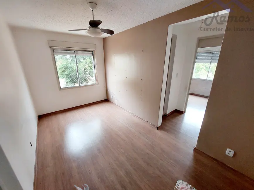 Foto 1 de Apartamento com 2 quartos à venda, 50m2 em Vila Nova, Porto Alegre - RS
