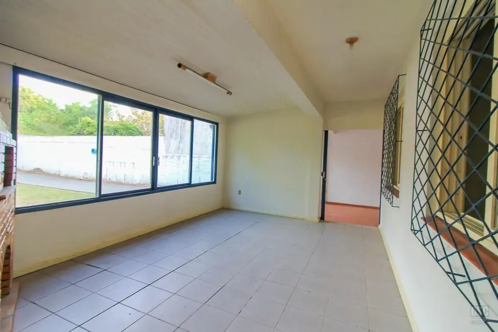 Foto 2 de Casa com 3 quartos à venda, 260m2 em Ipanema, Porto Alegre - RS