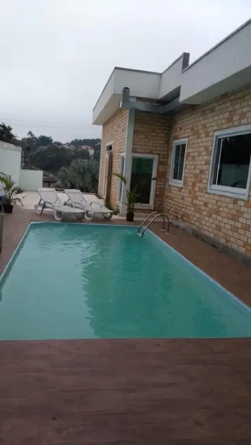 Foto 1 de Casa com 3 quartos à venda, 230m2 em Arujá Country Club, Itaquaquecetuba - SP